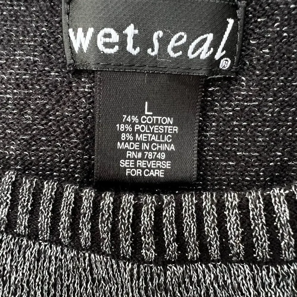 Wet Seal open/cold shoulder women's size L silver black shimmer sweater